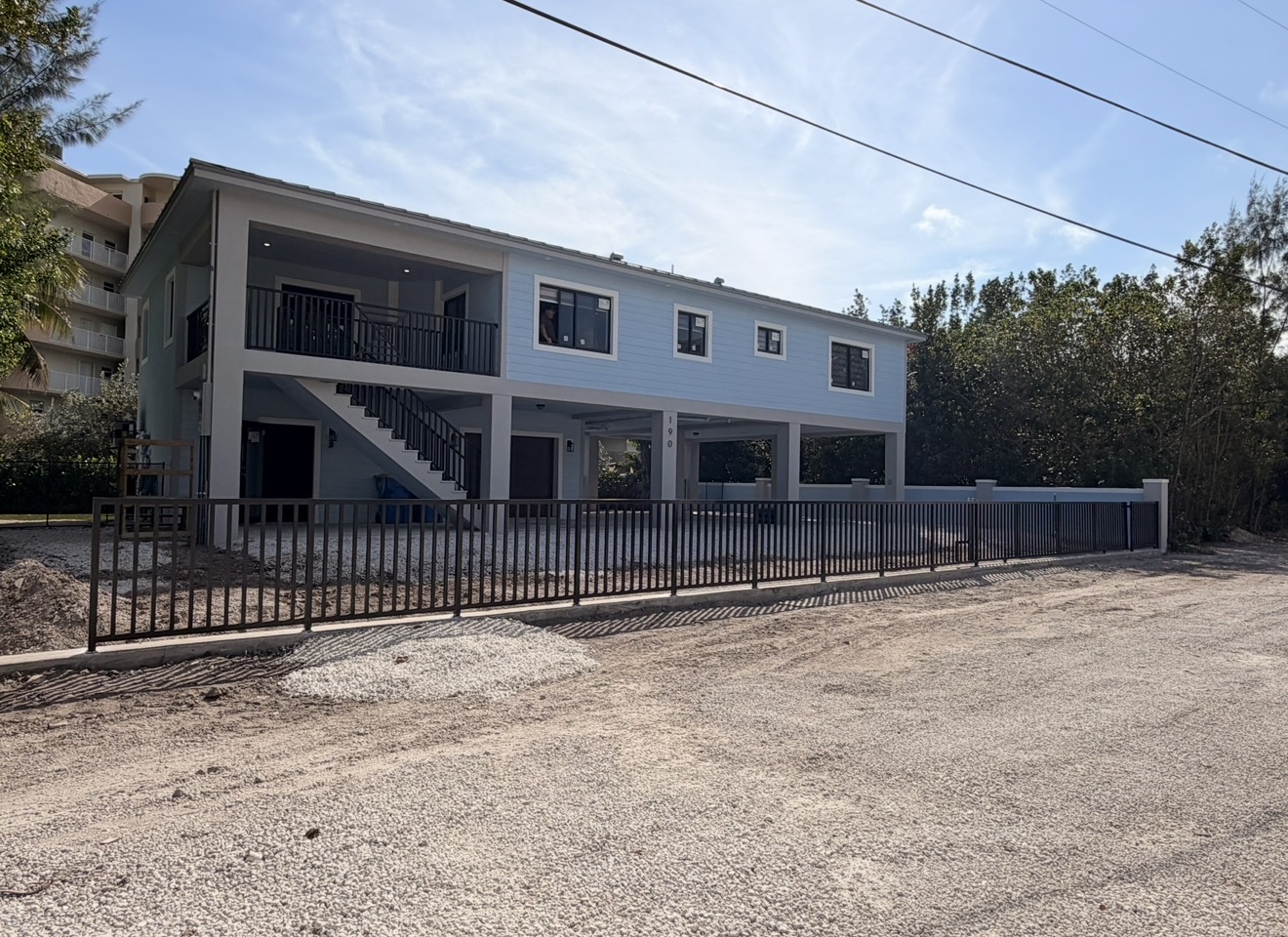 Vertical picket aluminum perimeter fence
