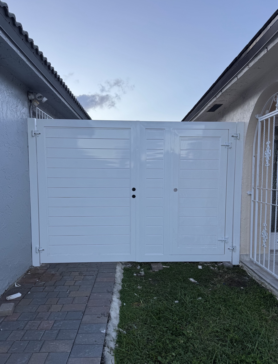 White custom privacy driveway gate