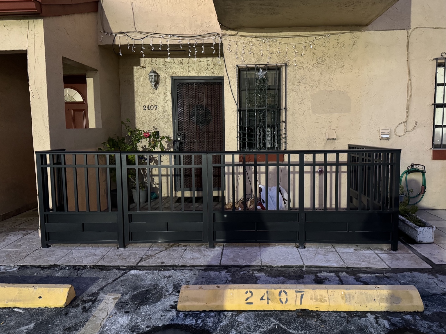 Custom black front entry railing