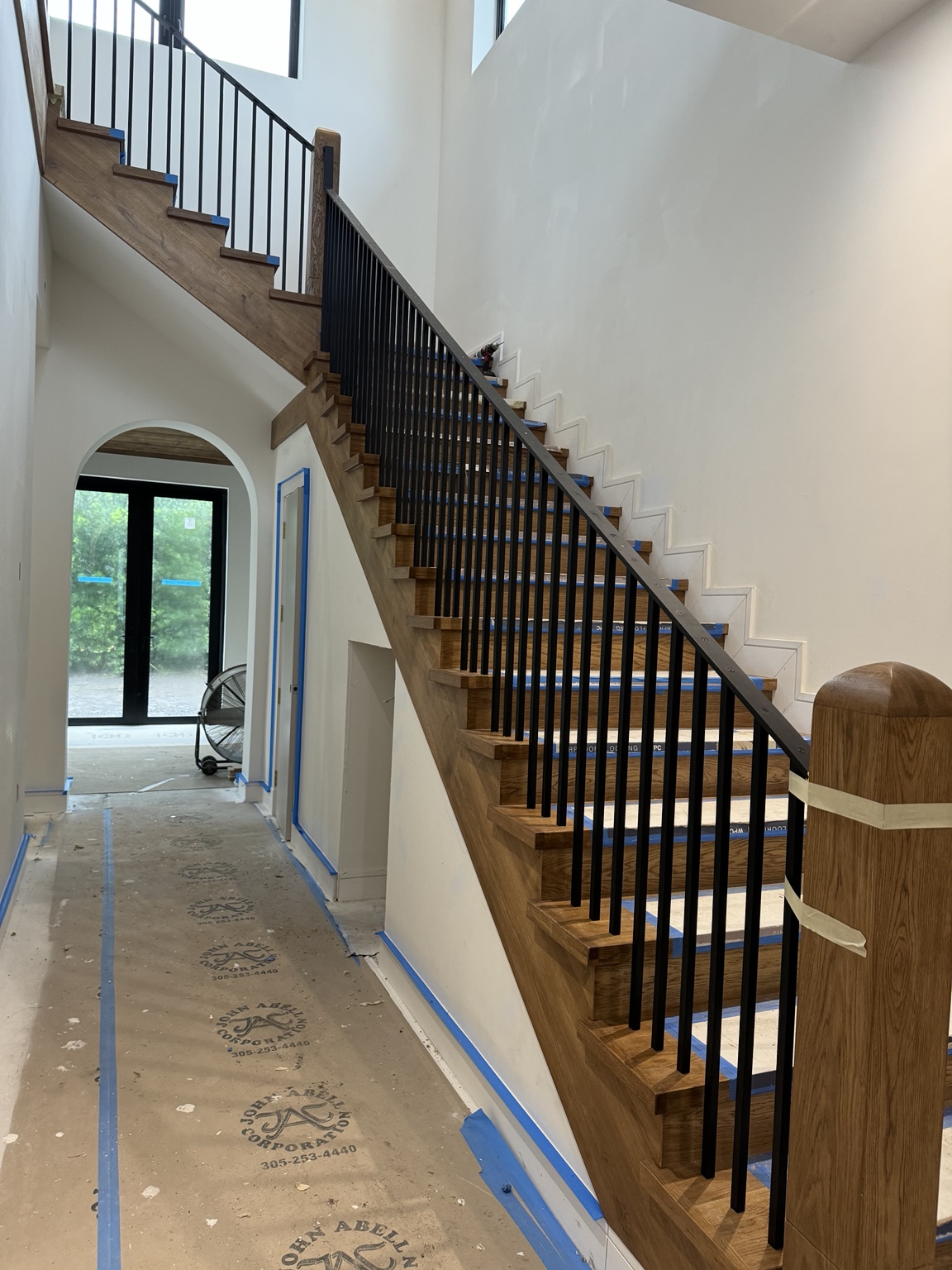 Modern interior staircase railing with vertical pickets